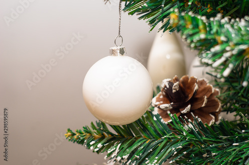 Christmas photo with holiday decorations, fir branches and festive bokeh lighting