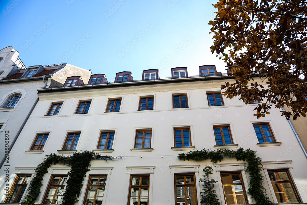 Naklejka premium beautiful street in the old town with renovated old town houses