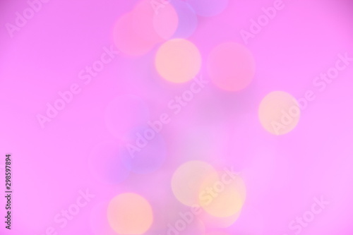 Colorful bokeh and pink background for background.
