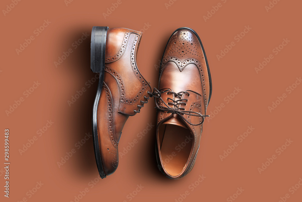 Brown leather men's shoes in classic style - obrazy, fototapety, plakaty 