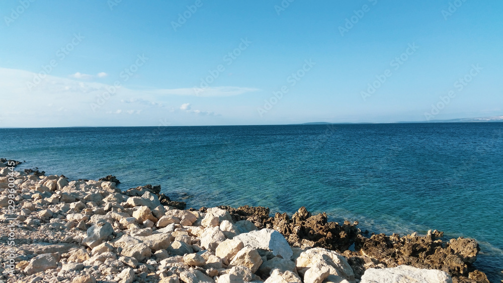 Coast of mediterranean sea. Blue sky & rocks. Vir, Croatia