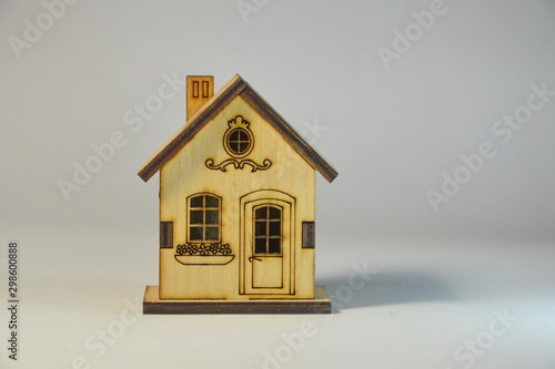 toy wooden house isolated on grey backgraund
