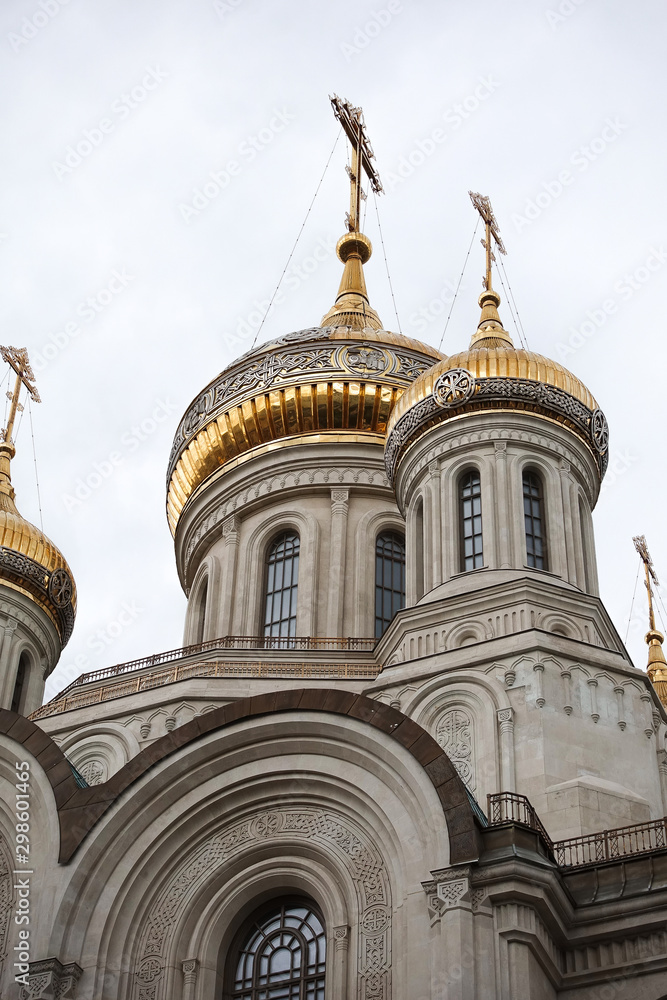 Eastern orthodox crosses on domes, cupolas, fog and cloudy weather.