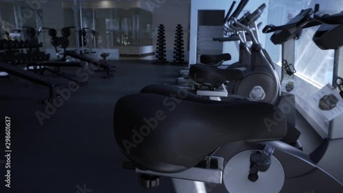 Inventory in the gym. Dumbbell and kettlebell close-up. Empty gym