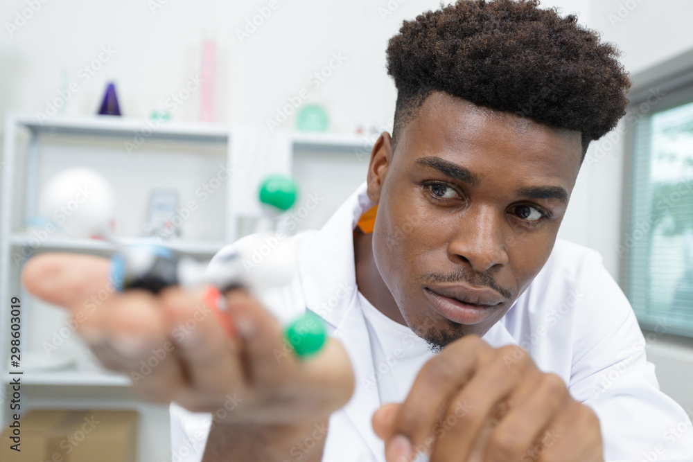 male scientist experimenting molecule structure male scientist experimenting molecule structure