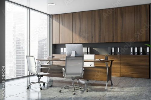 Stylish gray and wooden CEO office corner © ImageFlow