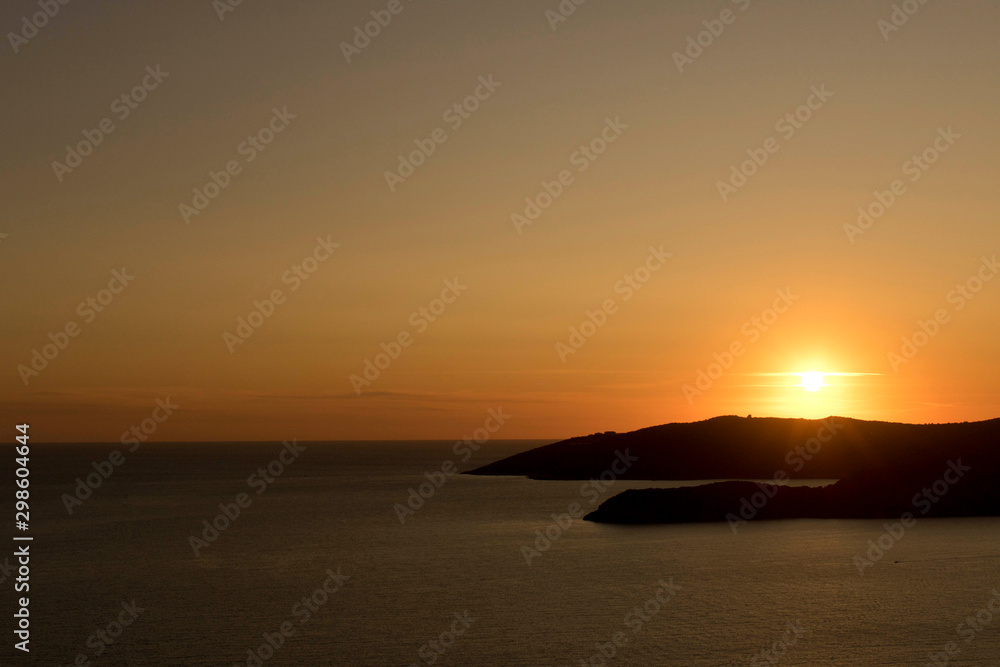 Colorful ocean sunset with the setting sun. Seascape at sunset. Colorful ocean sunset with the setting sun. Seascape at sunset.
