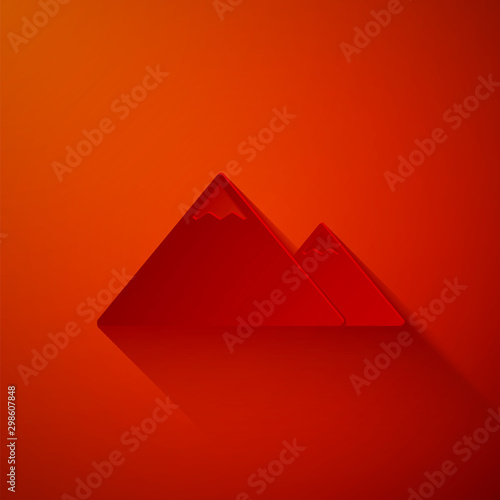 Paper cut Mountains icon isolated on red background. Symbol of victory or success concept. Paper art style. Vector Illustration