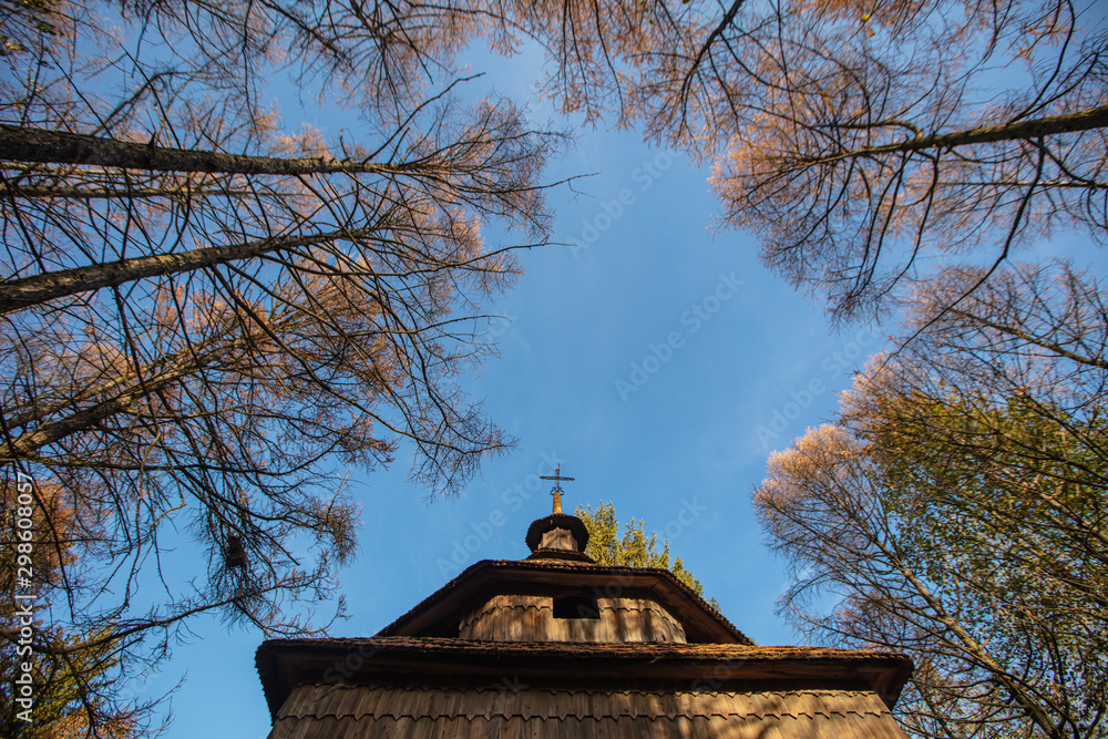Ancient village wooden church in Museum of Folk Architecture and Rural Life in Lviv (Shevchenkivsky Gai ) Ancient village wooden church in Museum of Folk Architecture and Rural Life in Lviv (Shevchenkivsky Gai )
