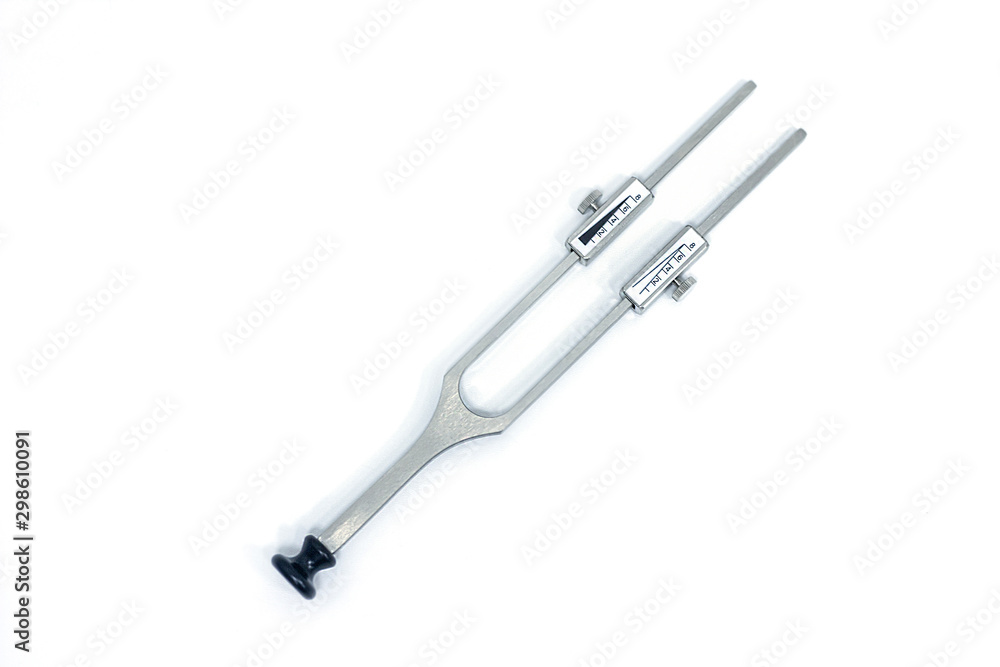 Medical, metal tools used in cosmetology, on a white isolated background, top view. Ruler for facelift. Medical, metal tools used in cosmetology, on a white isolated background, top view. Ruler for facelift.