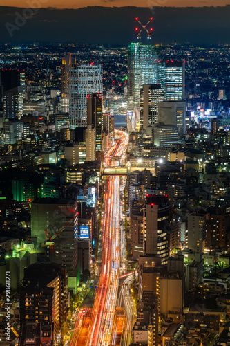 Tokyo city at night with busy traffic