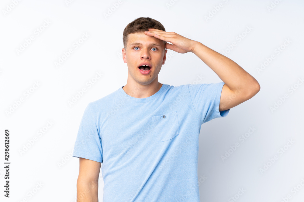 Young handsome man over isolated white background has just realized something and has intending the solution Young handsome man over isolated white background has just realized something and has intending the solution
