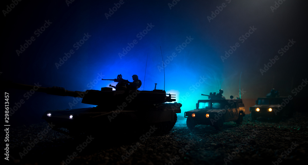 Military patrol car on sunset background. Army war concept. Silhouette of armored vehicle with soldiers ready to attack. Artwork decoration. Selective focus - obrazy, fototapety, plakaty 
