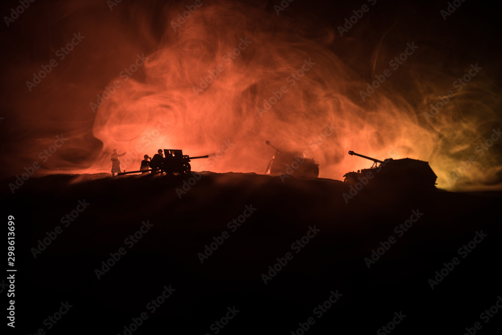 War Concept. Military silhouettes fighting scene on war fog sky background, World War German Tanks Silhouettes Below Cloudy Skyline At night. Attack scene. Armored vehicles and infantry.