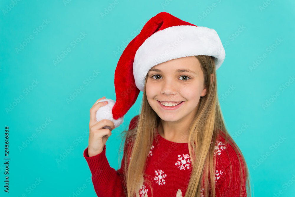 Santa claus kid. Little girl child in santa hat. Happy winter holidays. Small girl. Christmas shopping. Adorable smiling baby waiting for Santa. Greetings concept. Winter spirit. New year party Santa claus kid. Little girl child in santa hat. Happy winter holidays. Small girl. Christmas shopping. Adorable smiling baby waiting for Santa. Greetings concept. Winter spirit. New year party