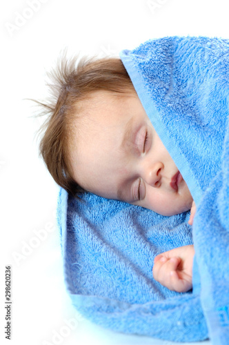 Close-up portrait of a sweet sleepping little girl © YouraPechkin
