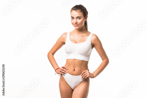 Young pretty woman wearing lingerie isolated on white background