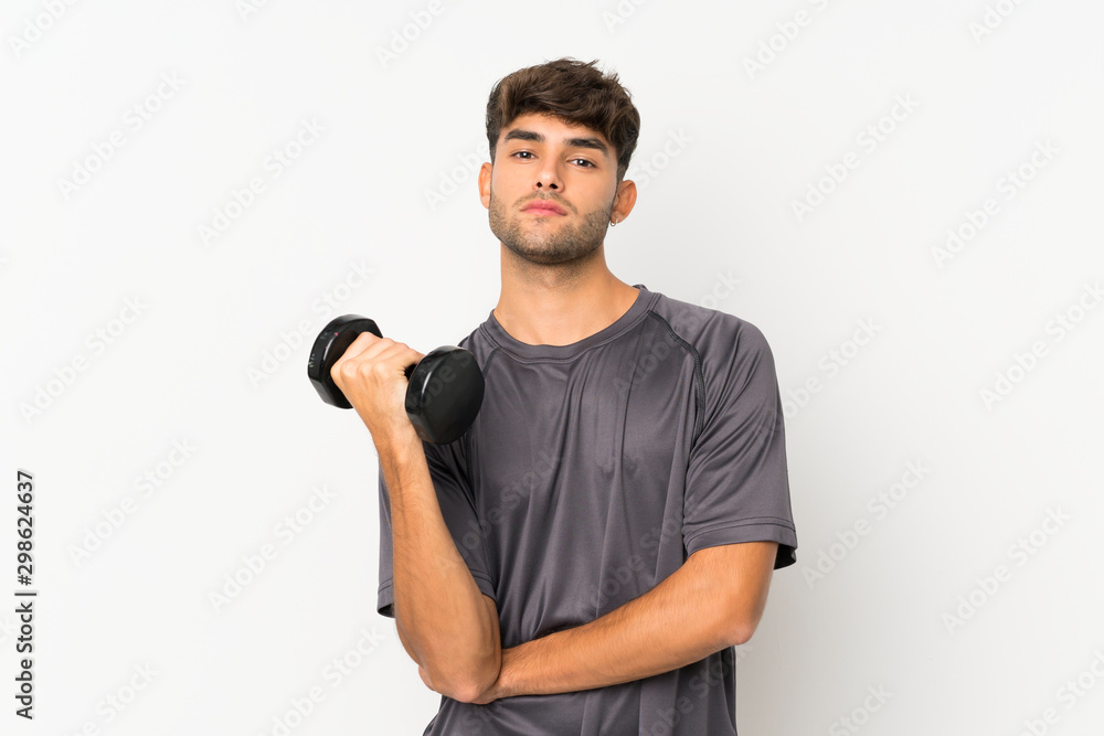 Sport man over isolated white wall Sport man over isolated white wall