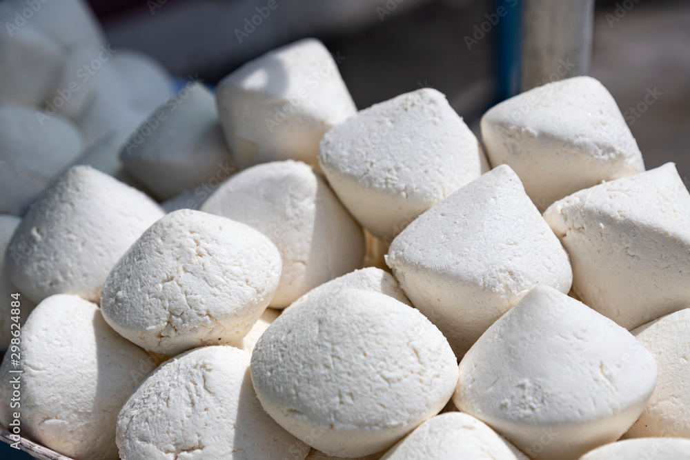 White piecies of national food kurt in the Kyrgyz market White piecies of national food kurt in the Kyrgyz market