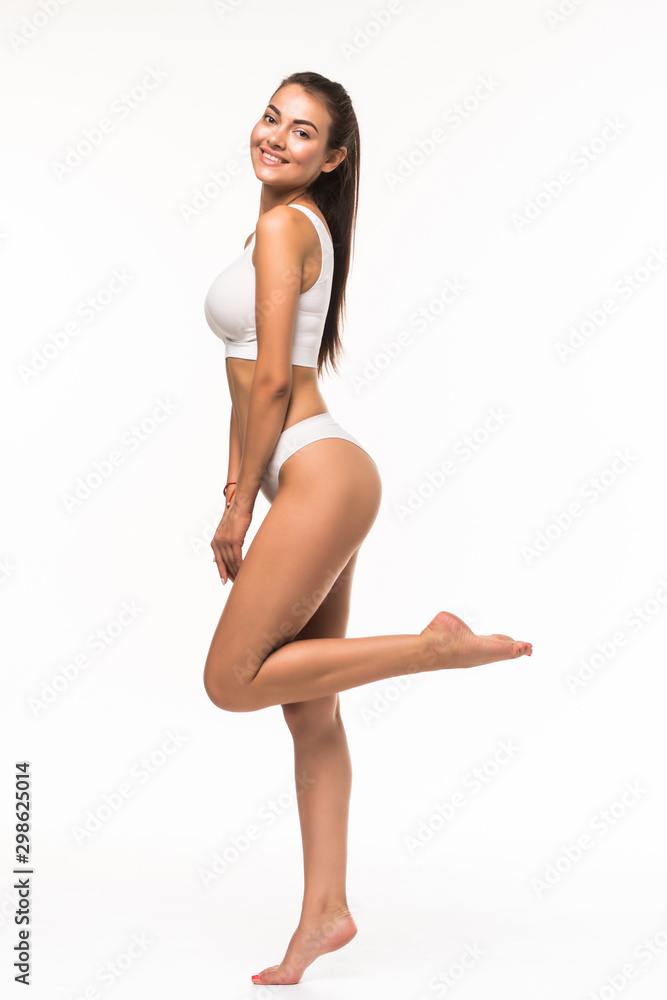 full height beautiful smiling woman in white underwaer and hat on a white background full height beautiful smiling woman in white underwaer and hat on a white background