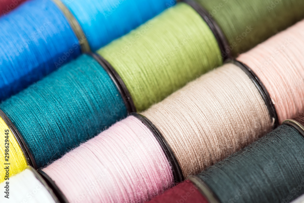 Colorful bobbin thread background Colorful bobbin thread background