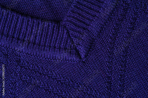 Fragment of the neck knitted blue sweatshirt