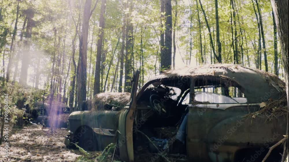 Sunlight Streaming Onto Old Antique Rusty Car Abandoned And