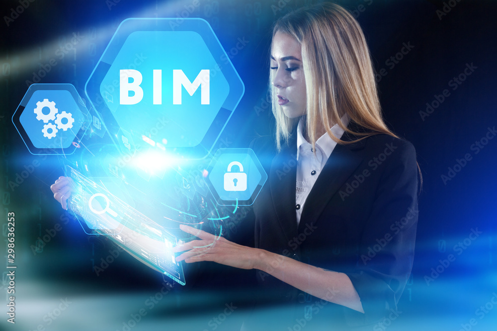 Business, Technology, Internet and network concept. Young businessman working on a virtual screen of the future and sees the inscription: BIM Business, Technology, Internet and network concept. Young businessman working on a virtual screen of the future and sees the inscription: BIM