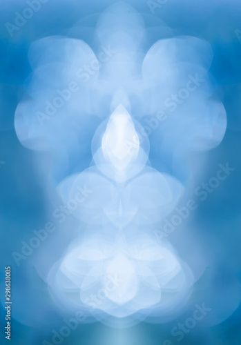 Abstract blurred blue background for Christmas or winter concept. Festive blu...