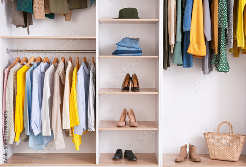 Fotografie, Obraz Big wardrobe with clothes in dressing room