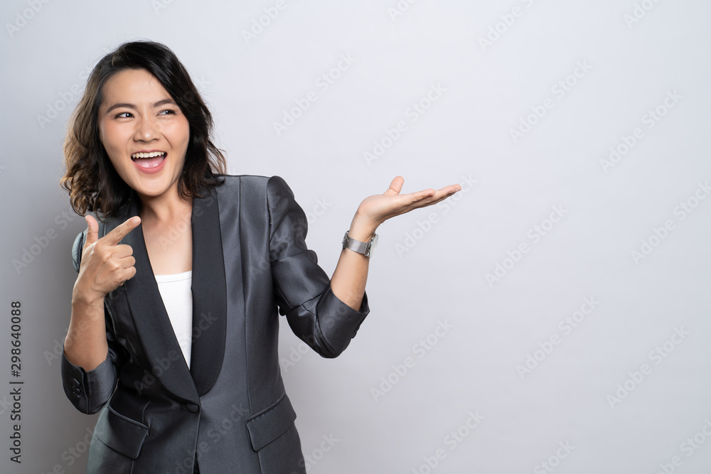 Happy woman present the copy space isolated over white background Happy woman present the copy space isolated over white background