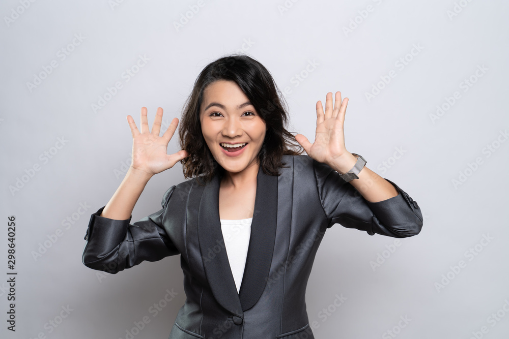 Portrait of excited woman isolated over background Portrait of excited woman isolated over background