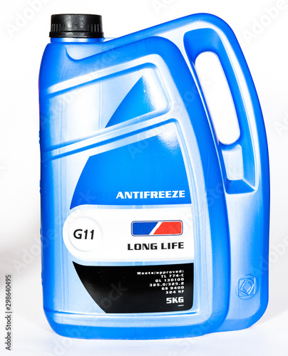 Single motor antifreeze bottle isolated on white background photo