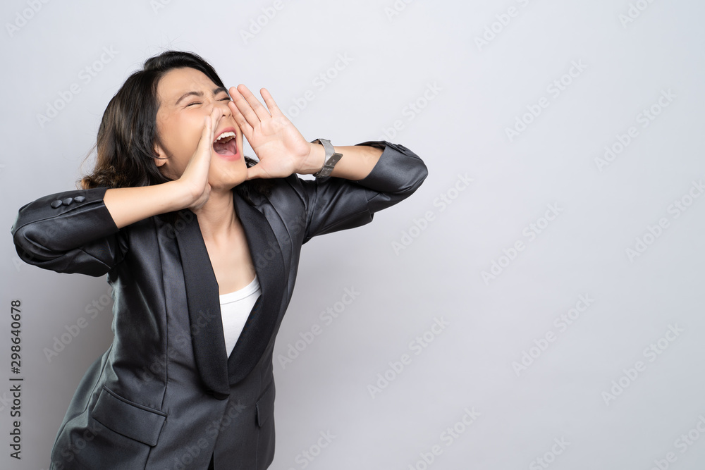 Happy woman making shout gesture isolated over white background - obrazy, fototapety, plakaty 
