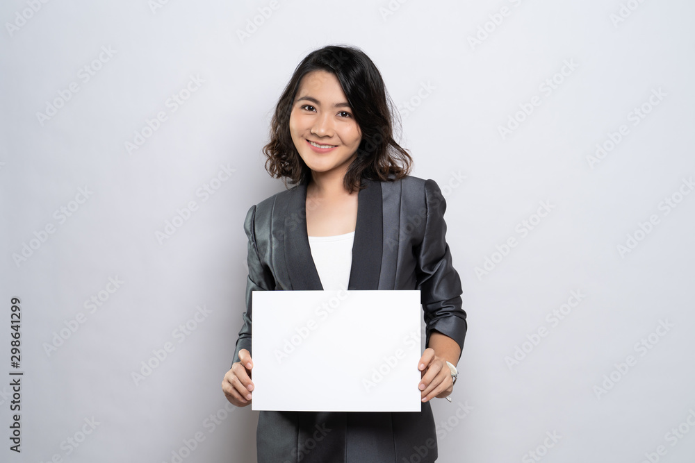 Business woman showing paper isolated over white background Business woman showing paper isolated over white background