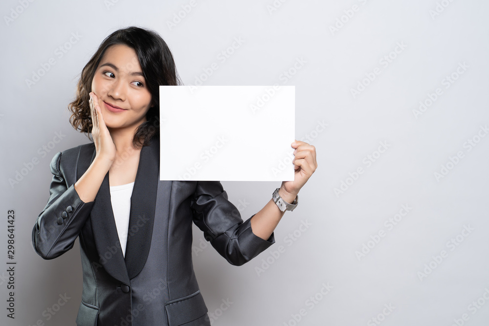 Business woman showing paper isolated over white background Business woman showing paper isolated over white background