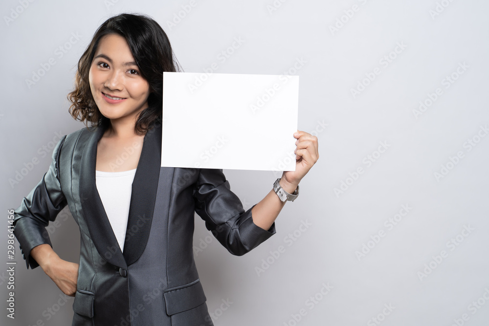 Business woman showing paper isolated over white background Business woman showing paper isolated over white background