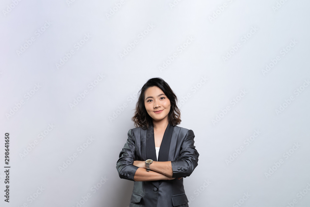 Happy woman thinking and standing isolated over white background Happy woman thinking and standing isolated over white background