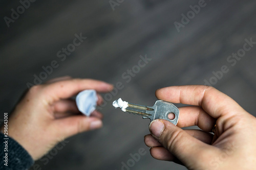 Photos Key used For Taking Bumps Of Drugs, snorting cocaine or speed addiction concept