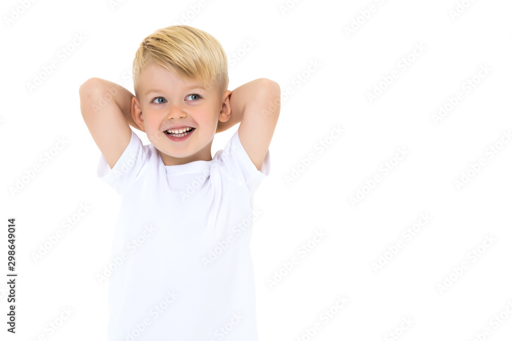 Emotional little boy in a pure white t-shirt. Emotional little boy in a pure white t-shirt.