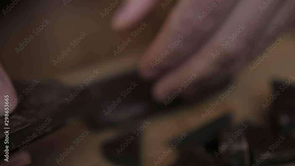 Man breaks chocolate bar. Slow motion. Close up. Hands break a bar of chocolate. Closeup. Man breaks chocolate bar. Slow motion. Close up. Hands break a bar of chocolate. Closeup.