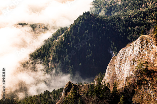 Fototapeta Naklejka Na Ścianę i Meble -  Autumn mountains in fog - view form the top