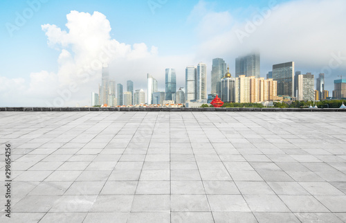 Panoramic skyline and buildings with empty concrete square floor,qingdao,china