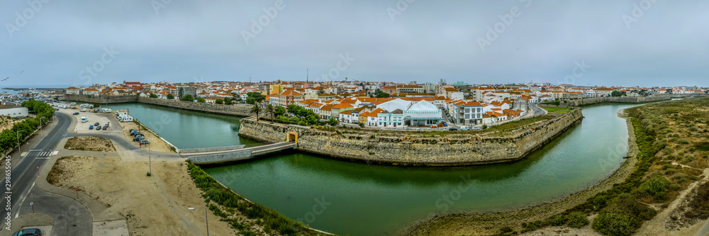 Aerial panoramic view of fishing village of Peniche on the Portuguese coast with former prison fortress