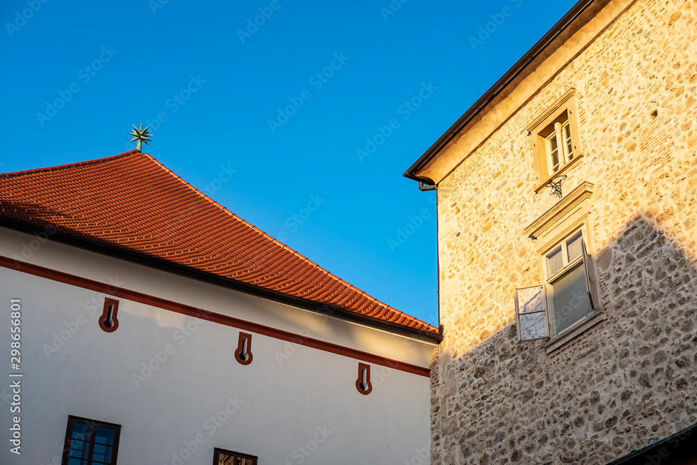 Reed roof at Stone gate on Upper town in Zagreb, Croatia in early summer morning, popular touristic destination, architectural detail