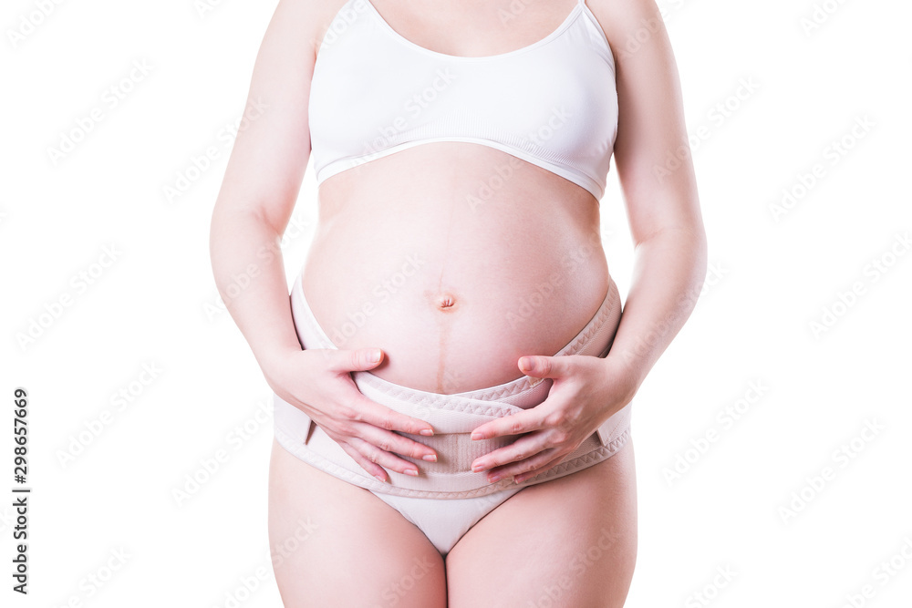 Pregnant woman with orthopedic support belt, isolated on white background Pregnant woman with orthopedic support belt, isolated on white background