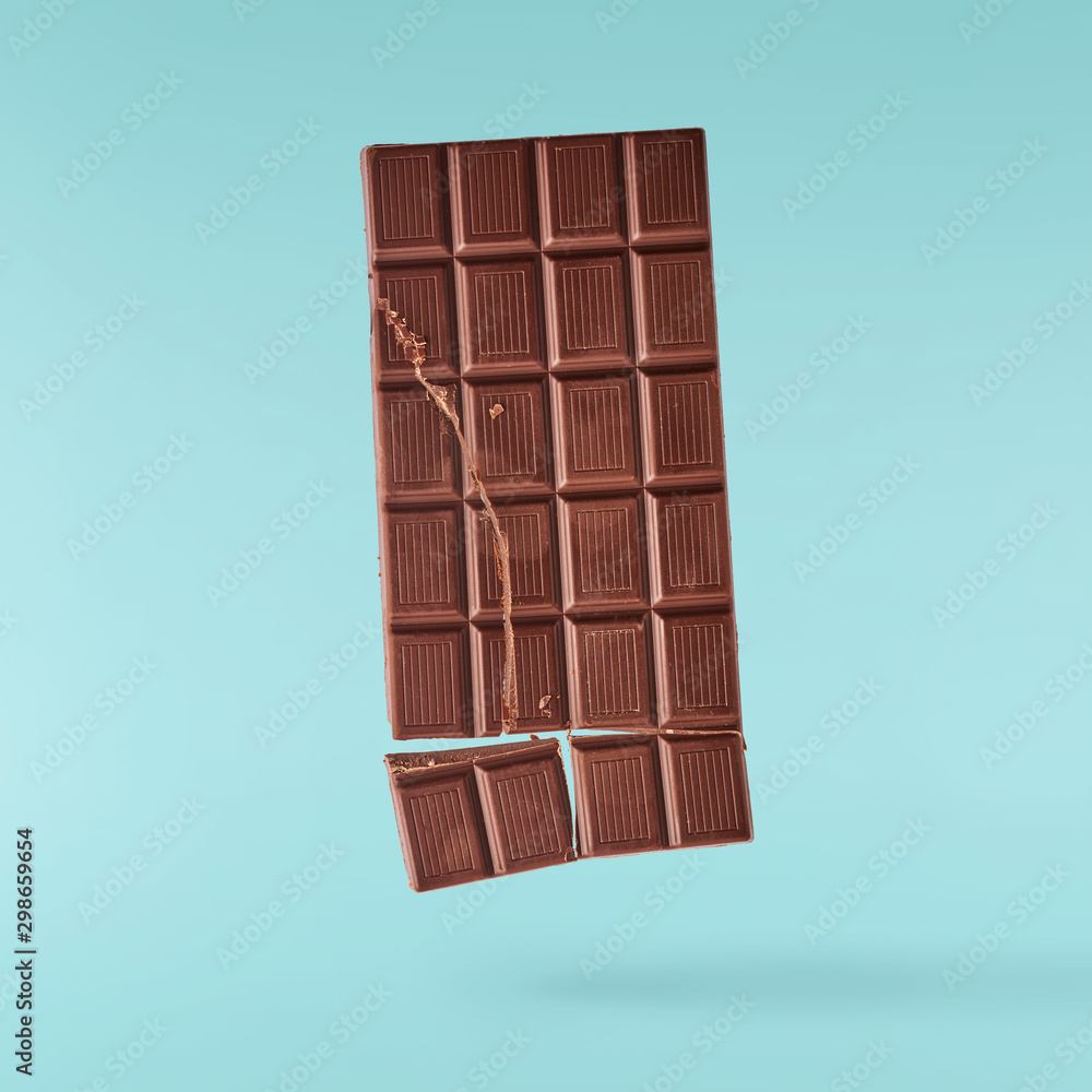 Delicious Chocolate flying in the air. High resolution levitation concept Delicious Chocolate flying in the air. High resolution levitation concept