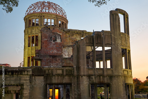 The skeletal ruins of Atomic Bomb Dome at the evening. Hiroshima. Japan photo