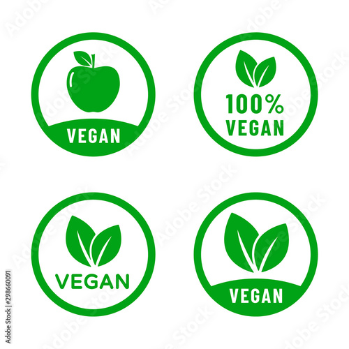 100% vegan food diet icon set. Organic, bio, eco symbols. Vegan, no meat, lactose free, healthy, nonviolent food. Round green vector illustrations with leaves and apple for stickers, labels and logos