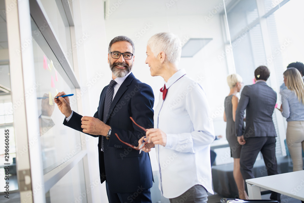 Business coworkers discussing new ideas and brainstorming in a modern office Business coworkers discussing new ideas and brainstorming in a modern office
